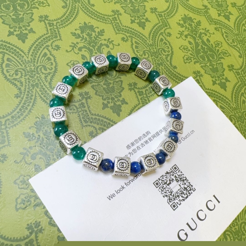 G*u*i bracelets